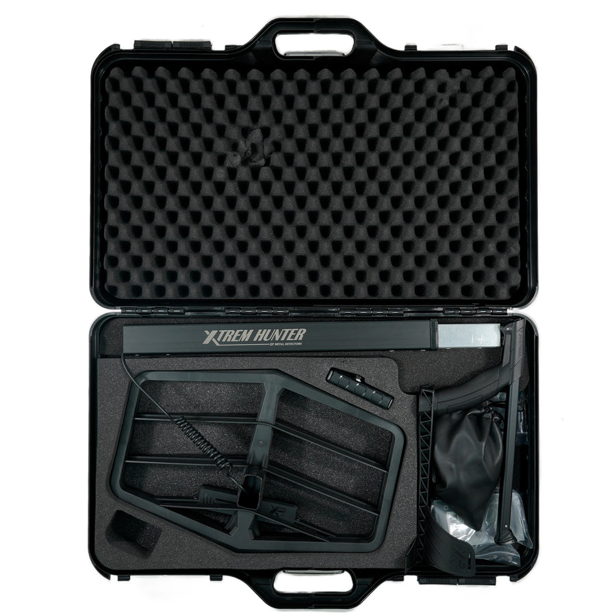 The XP XTREM Hunter metal detector, shown in the protective hard case. 
