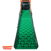 Green rubber sluice mate inside of a highbanker sluice with orange handles on a white background, featuring 'Highbanker Not Included' text.