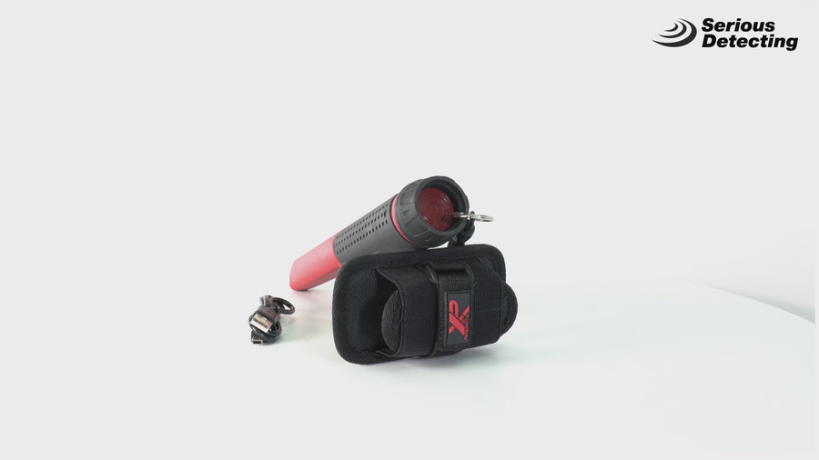 Turntable video of the red and black MI-6 Pinpointer, holster and charging cable, photographed on a white backdrop with the Serious Detecting logo in the corner
