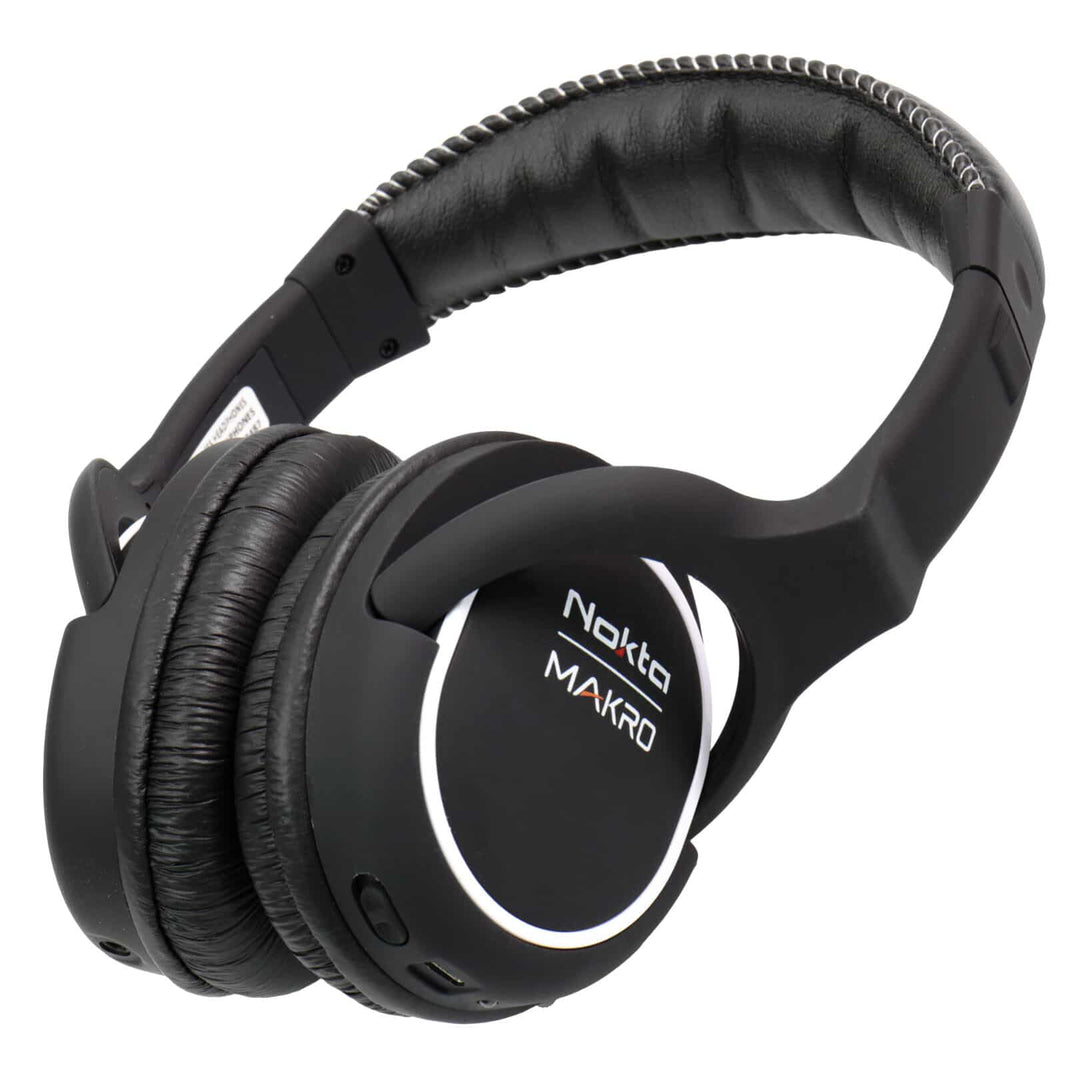 Close-up view of Nokta green wireless headphones showing adjustable headband and controls