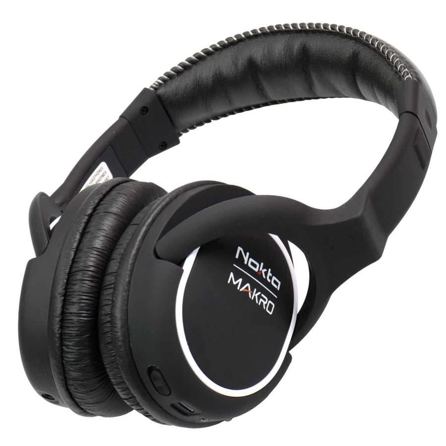 Close-up view of Nokta green wireless headphones showing adjustable headband and controls