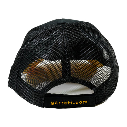 Garrett Apex metal detector cap worn by person outdoors