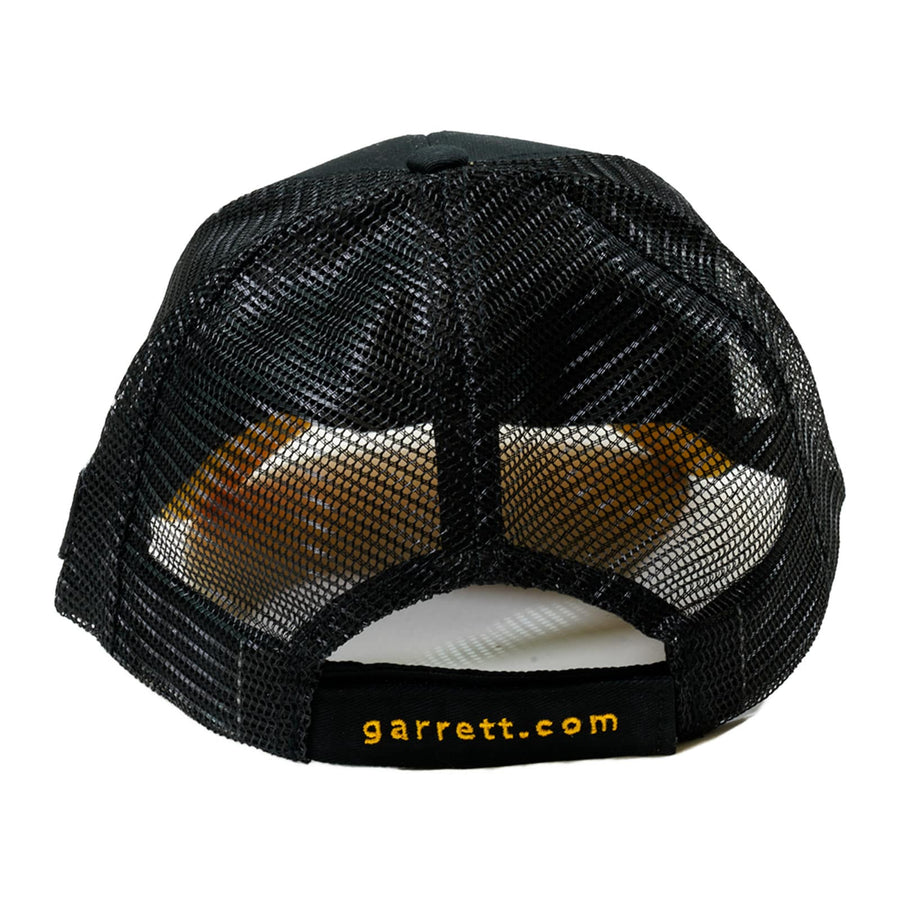 Garrett Apex metal detector cap worn by person outdoors