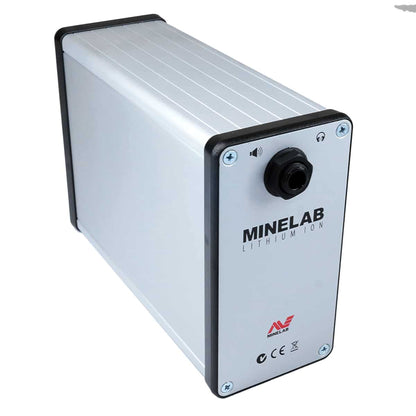 A Minelab lithium ion battery designed for powering metal detectors, with built-in amplifier. The battery is primarily silver with black and gray accents, featuring the Minelab brand logo and product information. Left side view