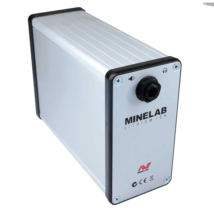 A Minelab lithium ion battery designed for powering metal detectors, with built-in amplifier. The battery is primarily silver with black and gray accents, featuring the Minelab brand logo and product information. Left side view