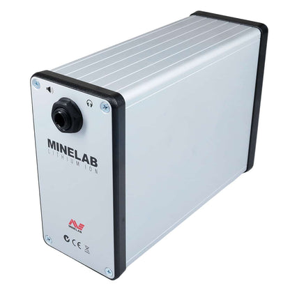 A Minelab lithium ion battery designed for powering metal detectors, with built-in amplifier. The battery is primarily silver with black and gray accents, featuring the Minelab brand logo and product information. Right side view