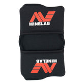 Black neoprene armrest cover for Minelab SDC 2300 metal detector showing cushioned padding