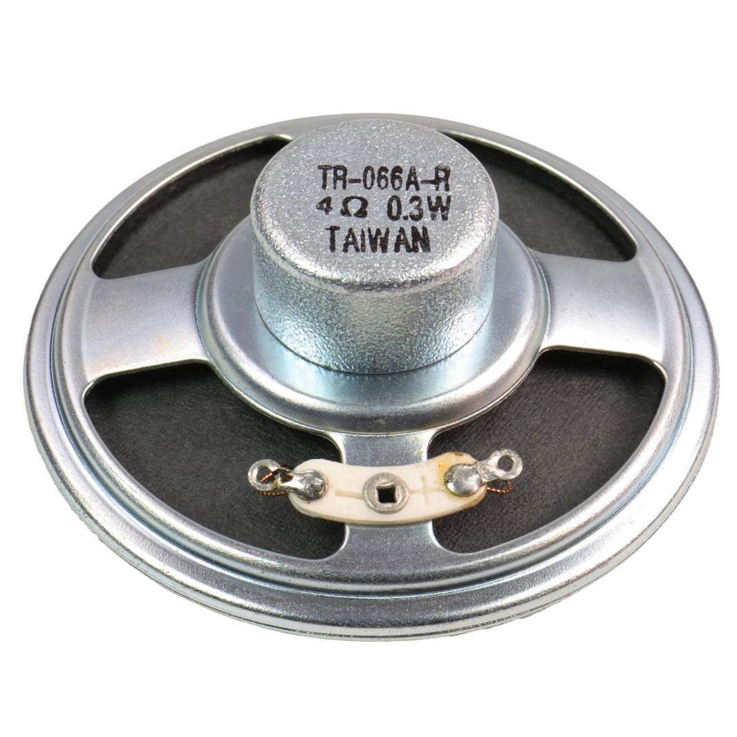 Close-up view of White's 4 ohm speaker showing paper cone construction and mounting