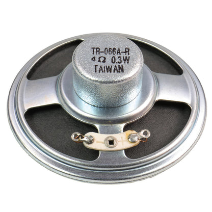 Close-up view of White's 4 ohm speaker showing paper cone construction and mounting