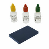 Complete gold testing kit with three acid bottles and black test stone
