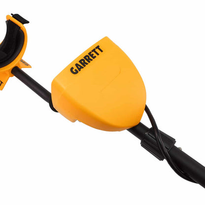 The yellow replacement Battery Cover for the Garrett ACE series Metal Detectors is shown attached to the control pod.  