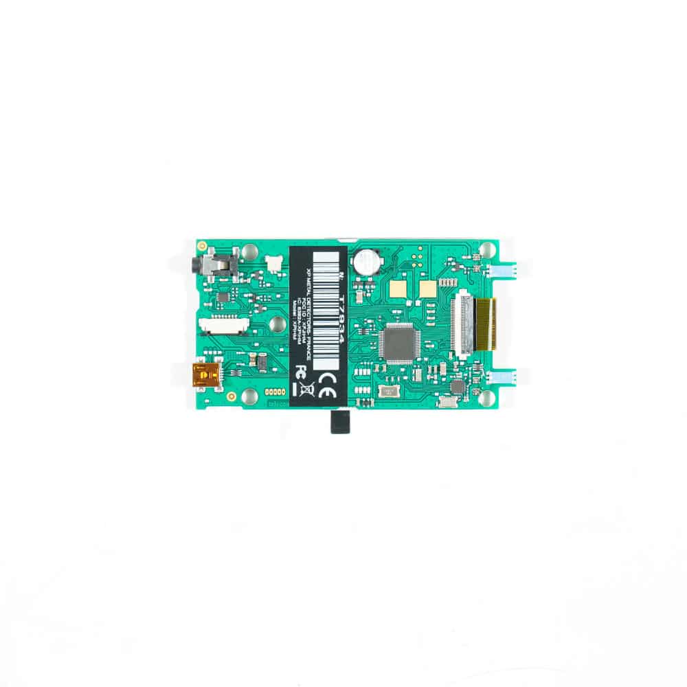Close-up view of XP Deus remote control circuit board LCD screen and control interface