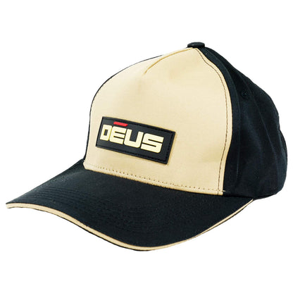XP Deus metal detector cap with beige and black colorblock design and embroidered logo patch