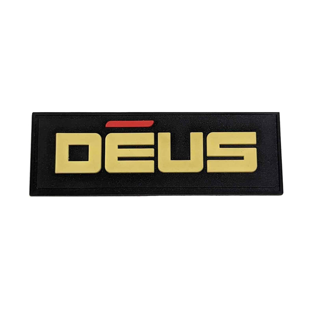 XP DEUS black rubber patch with white logo text on dark background