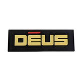 XP DEUS black rubber patch with white logo text on dark background