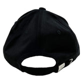 Close-up of embroidered XP Deus II logo on cap front