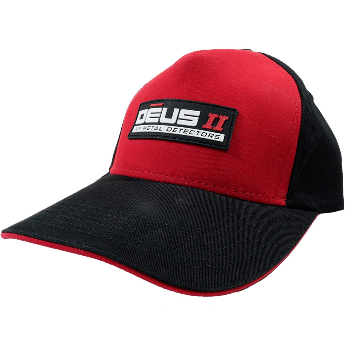 XP Deus II cap worn by metal detectorist in field setting