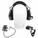 Front view of Gray Ghost Wireless Platinum headphones on a display head with transmitter and dual charger