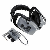 Gray Ghost Wireless Platinum headphones folded beside the 2.4 GHz transmitter with right-angle 1/4 inch plug