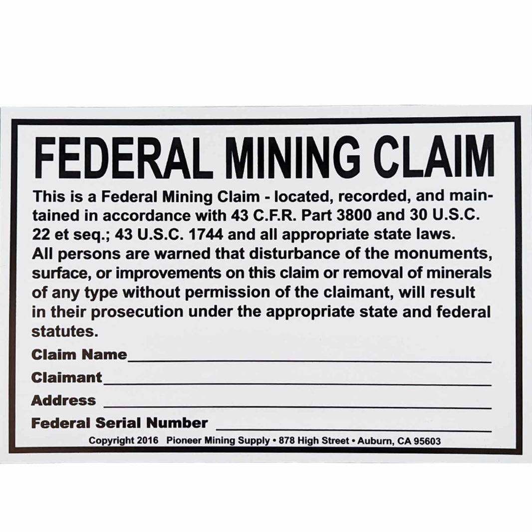 Blue Bowl federal mining claim sign showing white plastic with black text