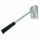 Dune Scoops sand scoop with rubber grip handle laying on beach sand