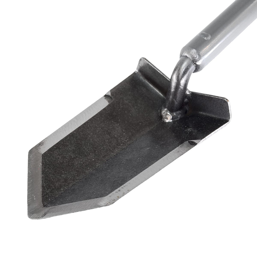 Lesche Sampson blade and lower shaft angled to show the foot step and blade thickness