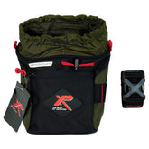 A green and black XP Metal Detectors Finds Pouch with red straps and a Molle attachment system, designed for carrying metal detecting equipment facing front