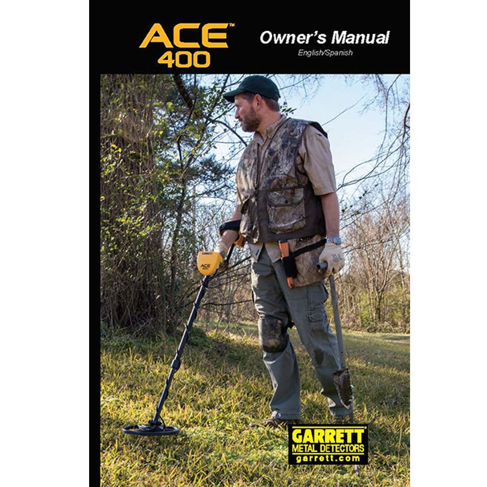 The cover of the English/Spanish version of the Garrett ACE 400 digital owner's manual, depicting a male detectorist in a grassy field. 