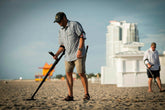 GO-FIND 22 metal detector being used for beach treasure hunting in sand