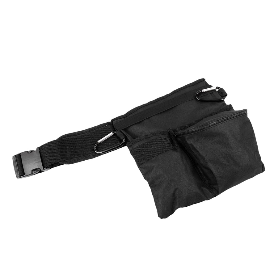 Close-up view of utility belt pockets and zippered compartment details