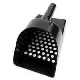 Close-up view of drainage holes in plastic metal detector sand scoop