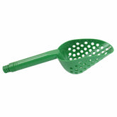Close-up view of plastic sand scoop showing perforated design and construction