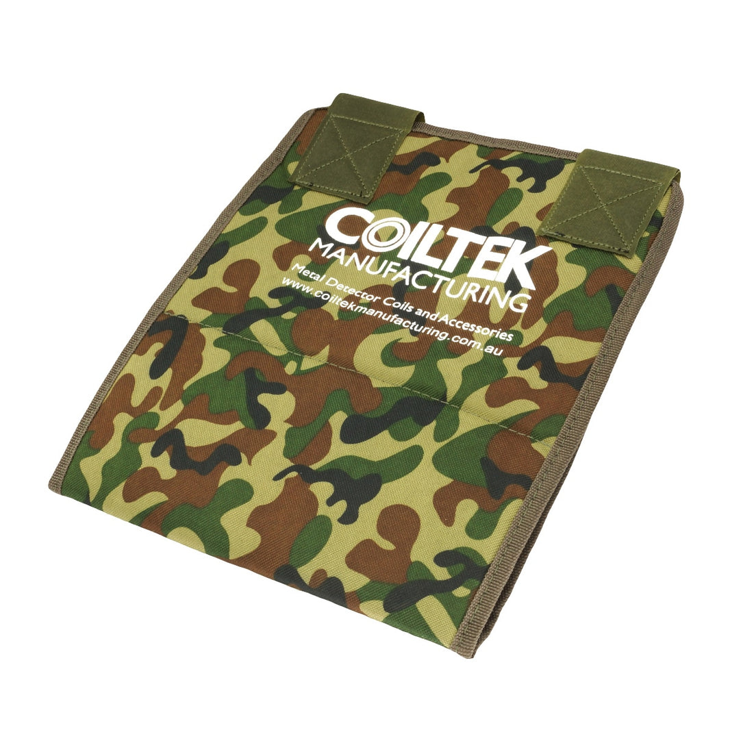 Coiltek camo battery cover detail view showing protective material and fit