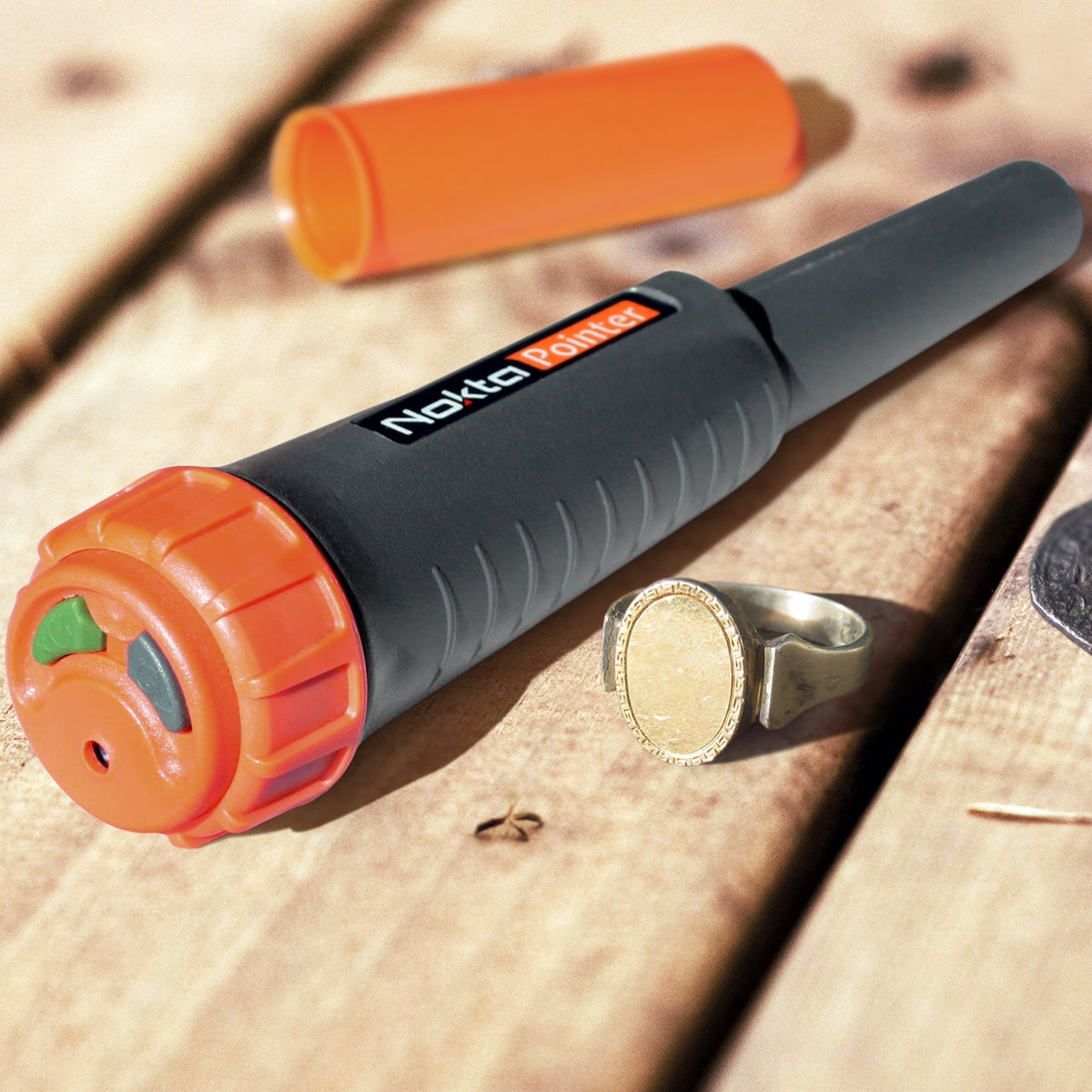 Nokta Pointer LED light illuminating dark hole for target recovery