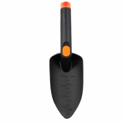 Close-up view of trowel blade showing 4-inch measuring scale markings