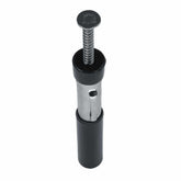 Close-up of TerraX separator pen showing quick-release plunger button and 5/8 inch shielded magnet tip