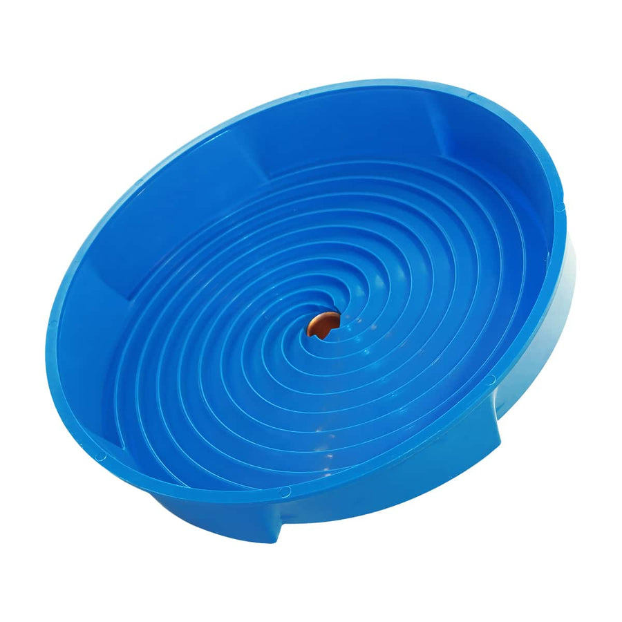 Angled view of the blue Gold Miner spiral wheel showing the recessed spiral grooves and center outlet.